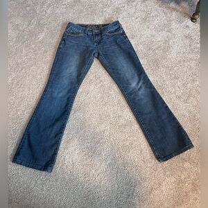 7 For All Mankind Dark Blue Bootcut Jeans With Embroidered Flap Pockets